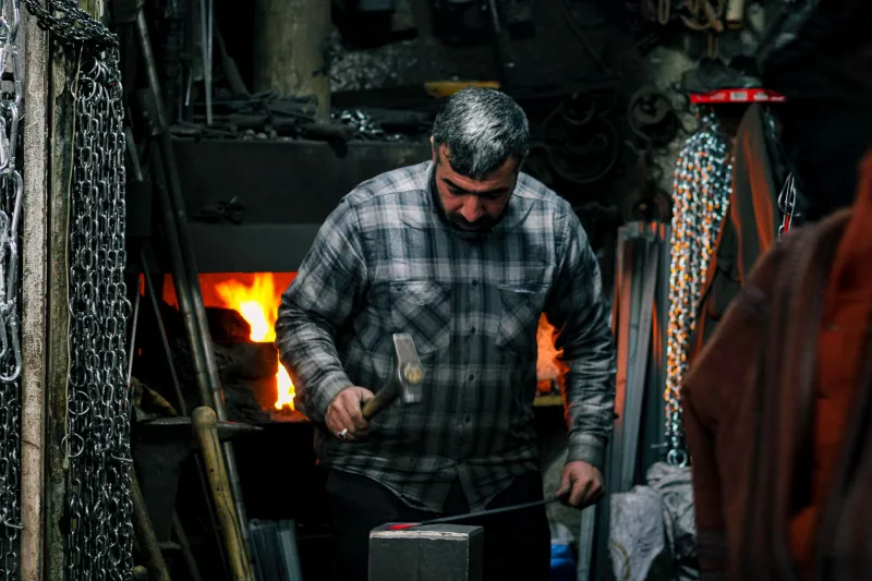 Fewer Tools, Faster Delivery: The Blacksmith's Case for Deliberate Technical Constraint